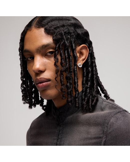 Orecchini Interlocking di Gucci in Metallic