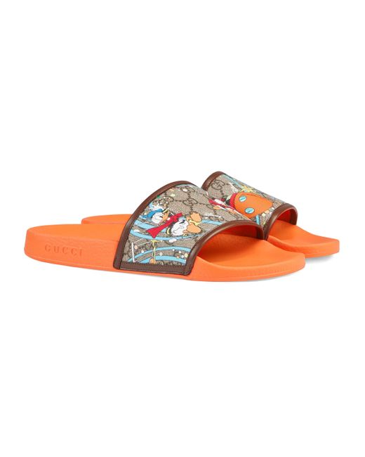 disney slides gucci