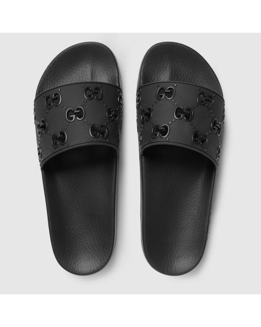 Gucci Pursuit GG Cutout Rubber Sliders in Black for Men | Lyst Canada
