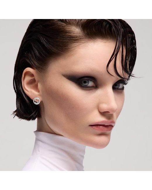 Orecchini Interlocking di Gucci in Metallic