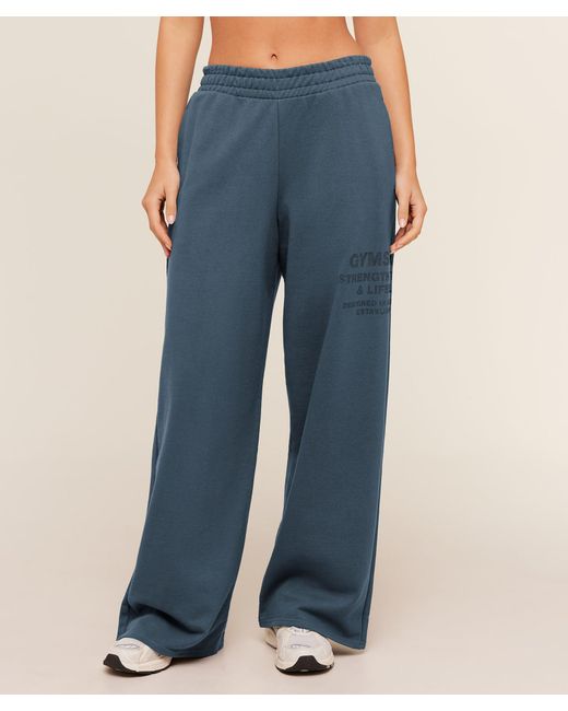 GYMSHARK Blue Stacked Graphic Wide Leg Joggers