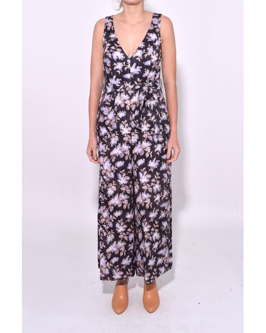 Zimmermann Stranded Jumpsuit In Black Lavender Floral | Lyst