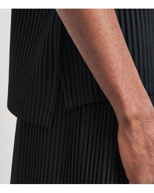 Homme Plissé Issey Miyake Black Pleated Polo Shirt for men