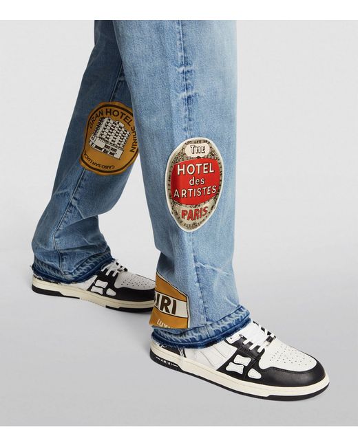 Amiri Blue Travel-patch Straight Jeans for men