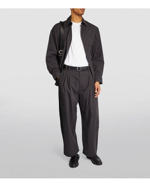 Studio Nicholson Black Cotton Pleated Wide-leg Trousers for men