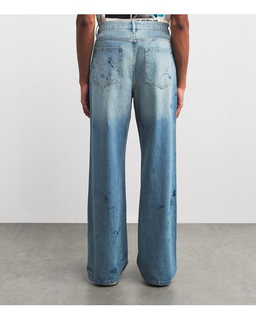 DOMREBEL Blue Scuffed Bootcut Jeans for men