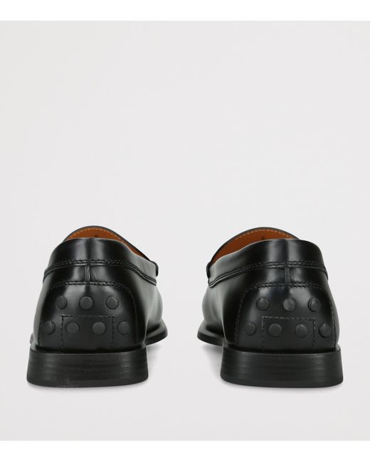 Tod's Black Leather Arricciato Gomma Loafers for men