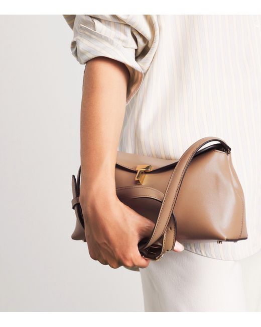Totême Brown Leather T-Lock Clutch Bag