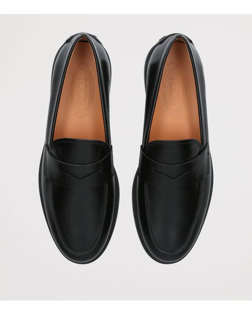 Tod's Black Leather Gomma Loafers for men