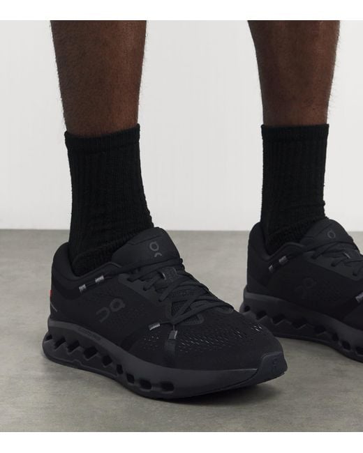 On Shoes Black Cloudsurfer 2 Trainers for men