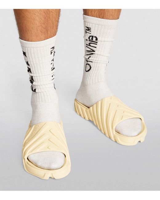 Off white slides on deals feet