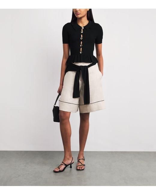 Claudie Pierlot Black Knitted Ribbed Peplum Sweater