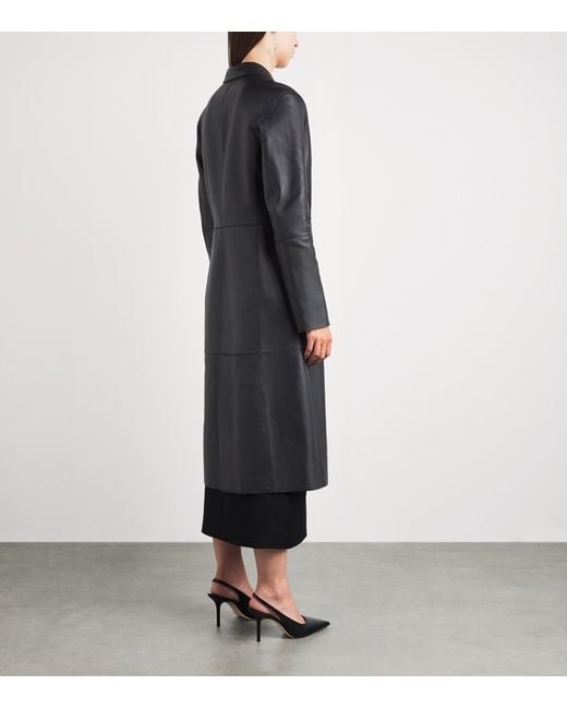 Totême Black Leather Trench Coat