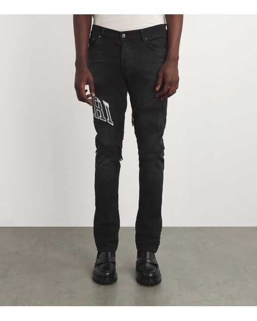 Amiri Black Varsity Repair Skinny Jeans for men