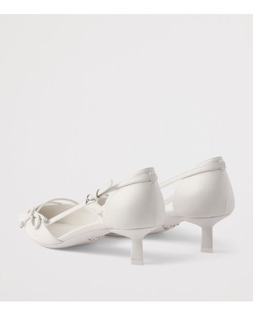 Prada White Leather Open-Side Pumps 45