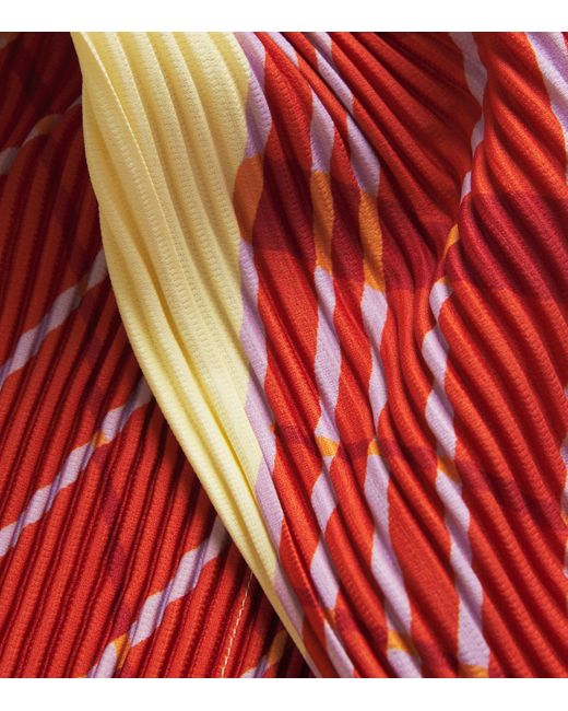 Homme Plissé Issey Miyake Red Pleated Windswept Print Shorts for men