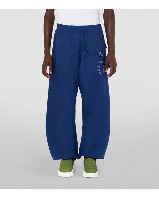 J.W. Anderson Blue Oversized Logo Twisted Sweatpants for men