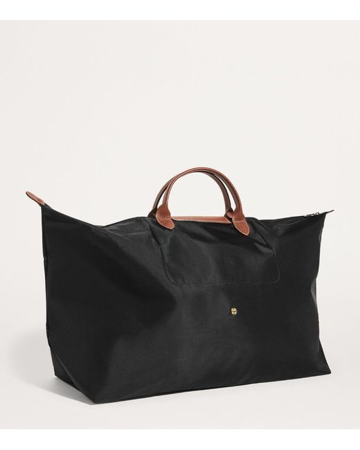 Longchamp Medium Le Pliage Original Travel Bag in Black Lyst UK