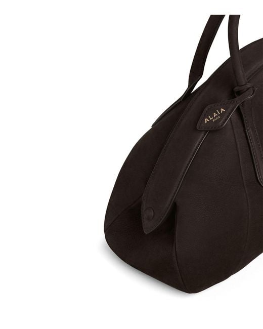 Alaïa Black Leather Purse Top-Handle Bag