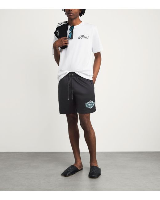 Amiri Black Chateau Crest Swim Shorts for men