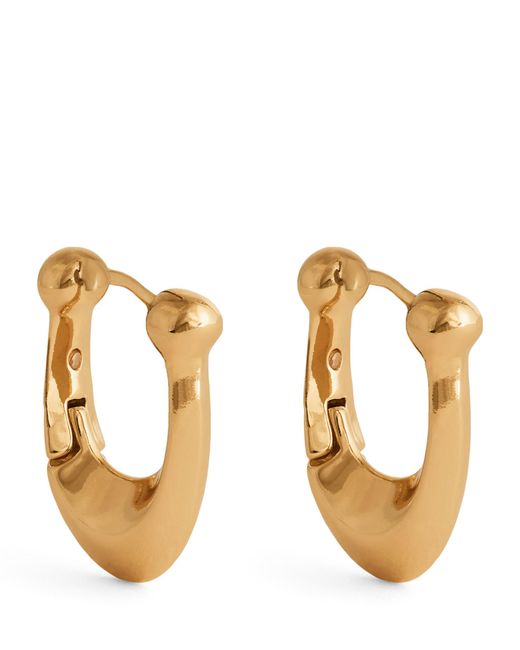 COACH Metallic Brass Signature C Huggie Earrings