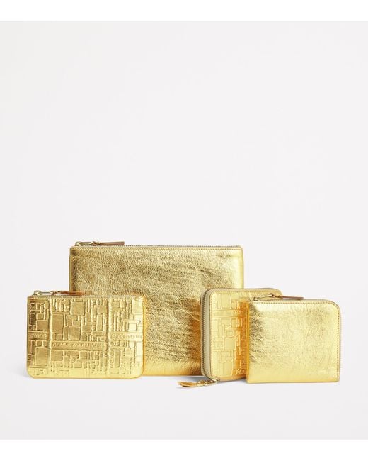 Comme des Garçons Metallic Leather Embossed Logo Zipped Wallet for men