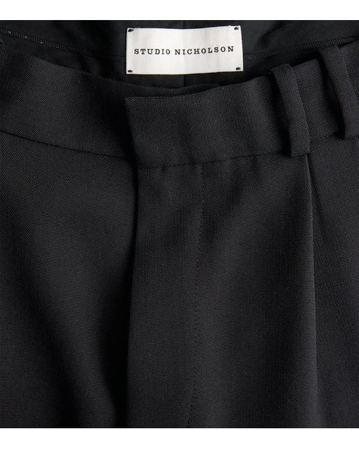 Studio Nicholson Black Double Pleated Barrel-Leg Trousers for men