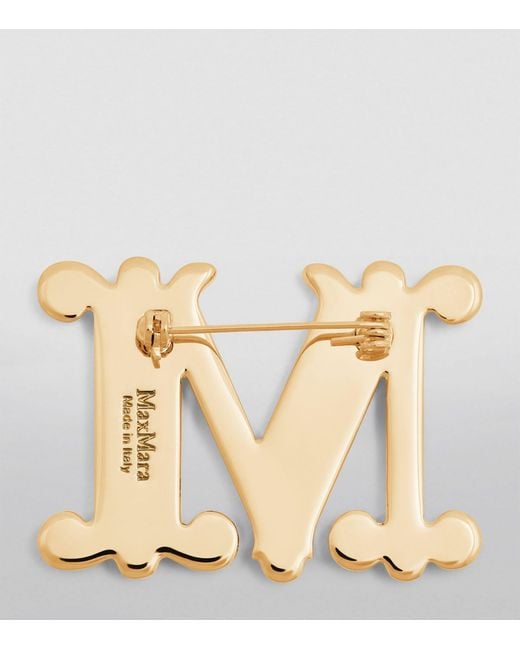 Monogram brooch 2024