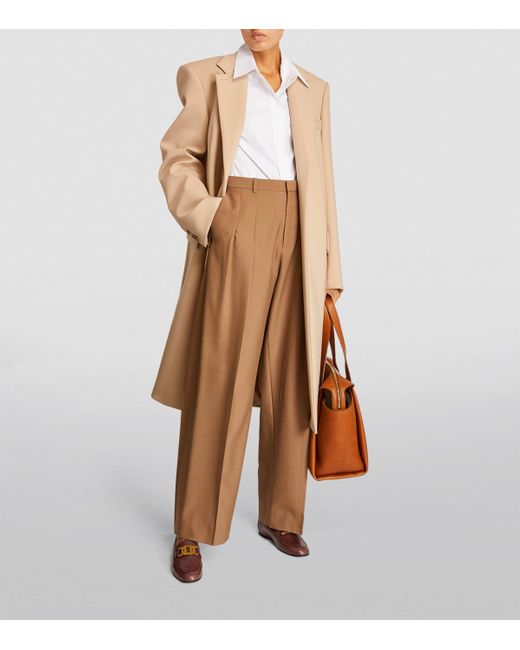 Tod's Brown Chain-Bit Loafers