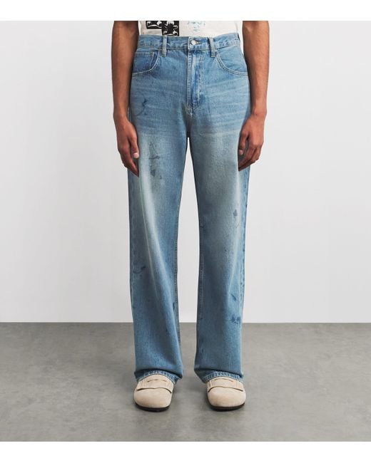 DOMREBEL Blue Scuffed Bootcut Jeans for men