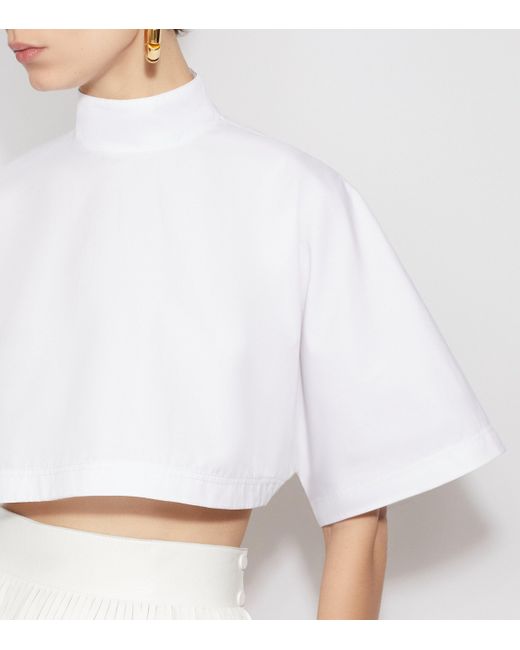 Alaïa White High-Neck Crop Top