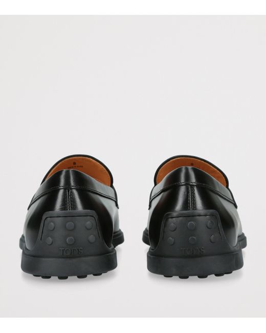 Tod's Black Leather Gomma Loafers for men