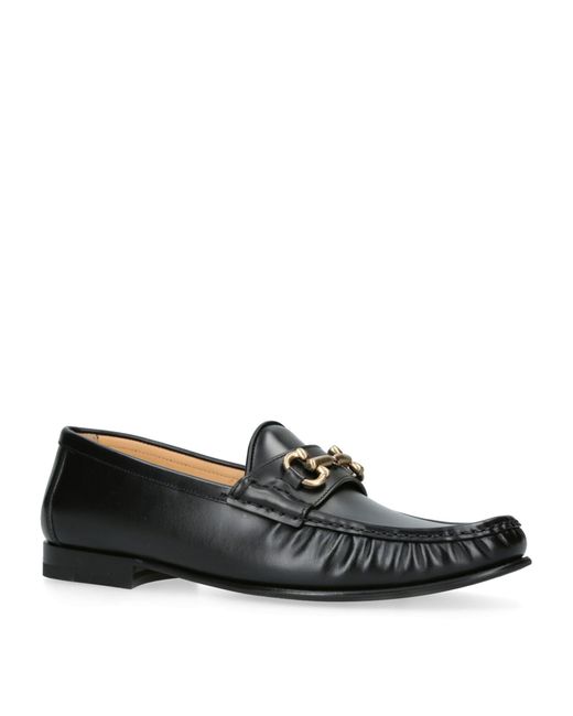 Brunello Cucinelli Black Leather Buckle Loafers for men