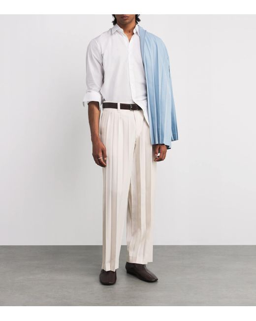 Homme Plissé Issey Miyake White Pleated Edge Ensemble Trousers for men