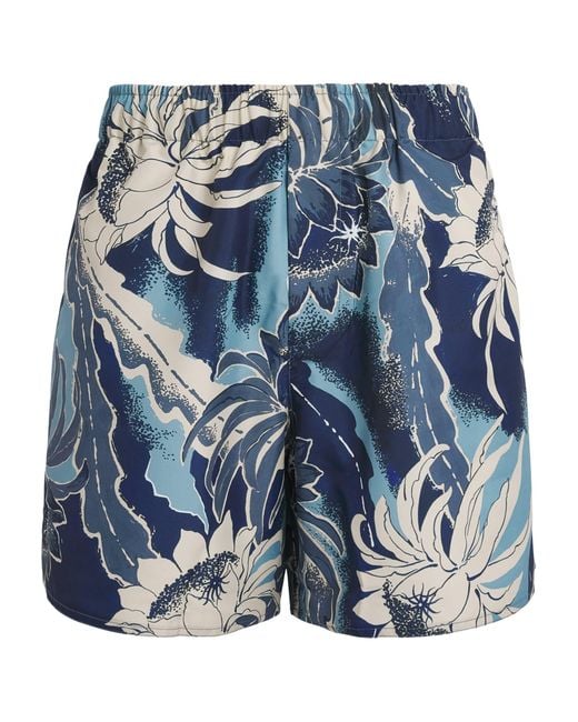 J.W. Anderson Blue Floral Print Swim Shorts for men