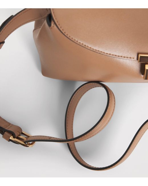 Totême Brown Leather T-Lock Clutch Bag