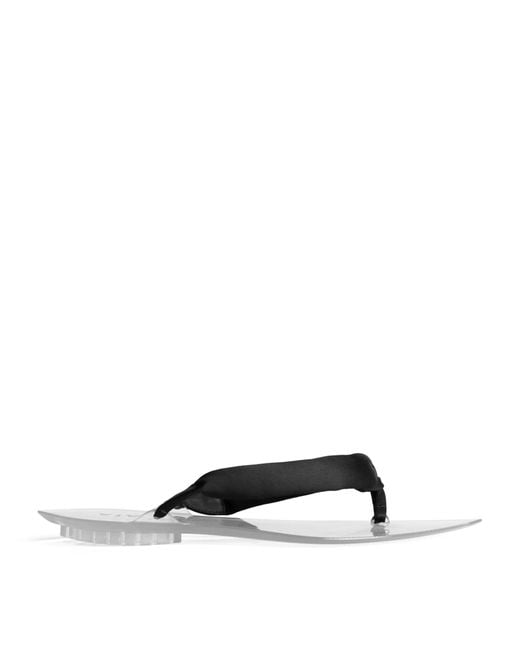 Alaïa Black Invisible Thong Flip Flops