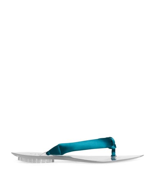 Alaïa Blue Invisible Thong Flip Flops