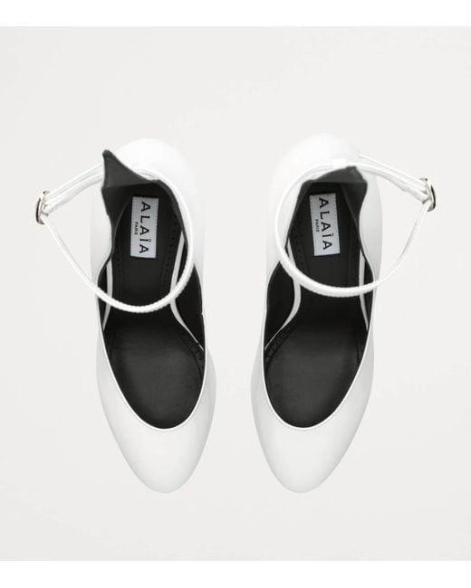 Alaïa White Patent Leather Decollete Pumps 90