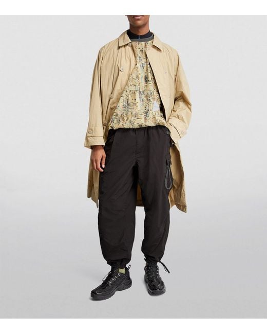 And Wander Black Oversized Cargo Trousers for men