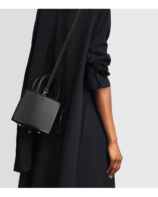 TALEL PARIS Black Leather Triangle Top-Handle Bag
