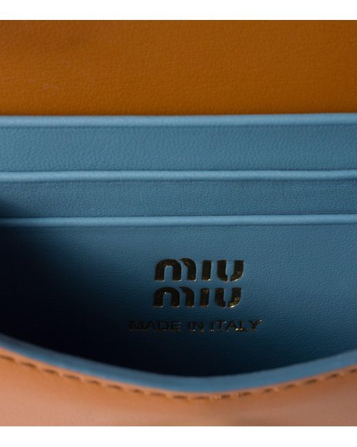Miu Miu Brown Leather Tassel Chain Wallet