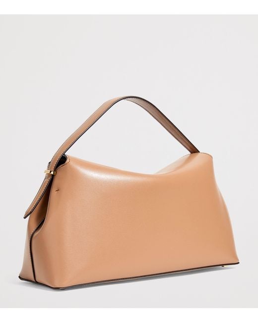Totême Natural Large Leather T-Lock Top-Handle Bag