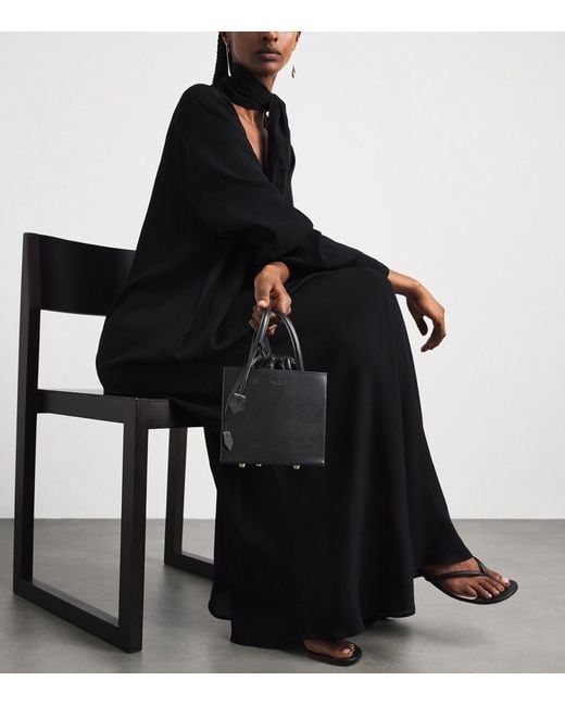 TALEL PARIS Black Leather Triangle Top-Handle Bag