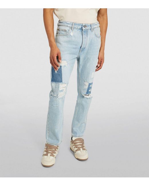 Palm Angels Blue Distressed Patch Slim Jeans for men
