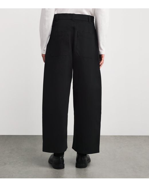Studio Nicholson Black Cotton Pleated Sorte Trousers for men