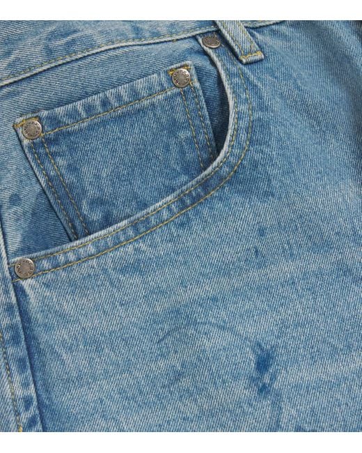 DOMREBEL Blue Scuffed Bootcut Jeans for men