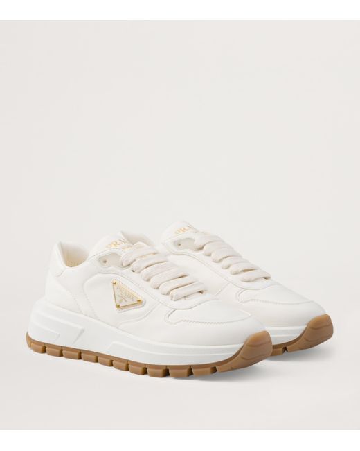 Prada White Leather Triangle Sneakers