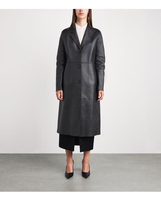 Totême Black Leather Trench Coat
