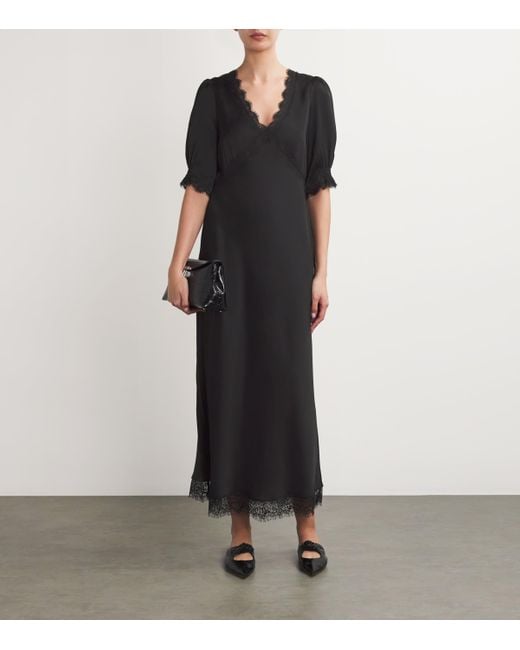 RIXO Black Knit Dress with Animal Print Details.